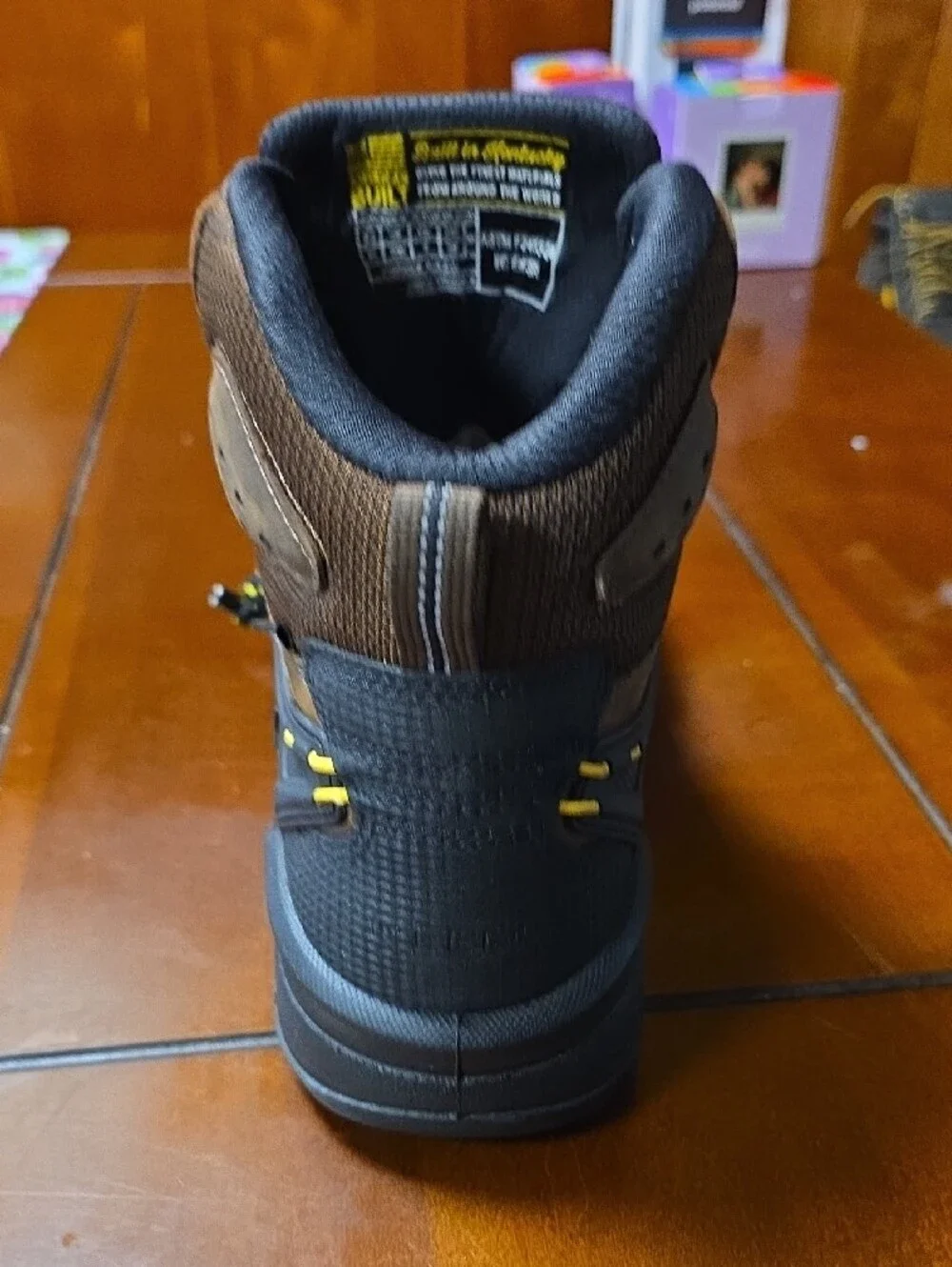 Keen Brown and Black Men's Waterproof Mid-Height Hiking Boot with Yellow Accents
